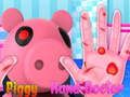 Lojë Piggy trajton duart e tij  në internet