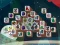 Lojë Among Mahjong Tiles në internet