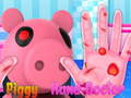Lojë Piggy trajton duart e tij  në internet